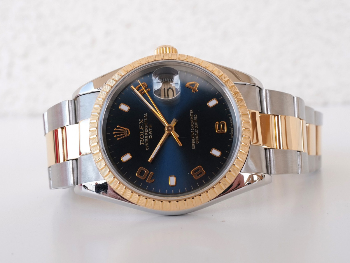 Швейцарський годинник Rolex Oyster Perpetual Date 34 Steel Gold Blue Dial