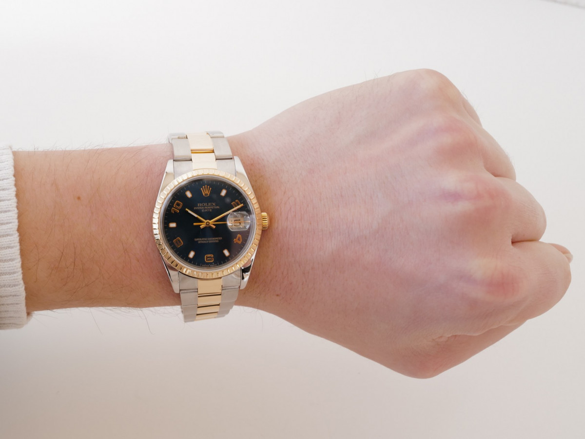 Швейцарський годинник Rolex Oyster Perpetual Date 34 Steel Gold Blue Dial