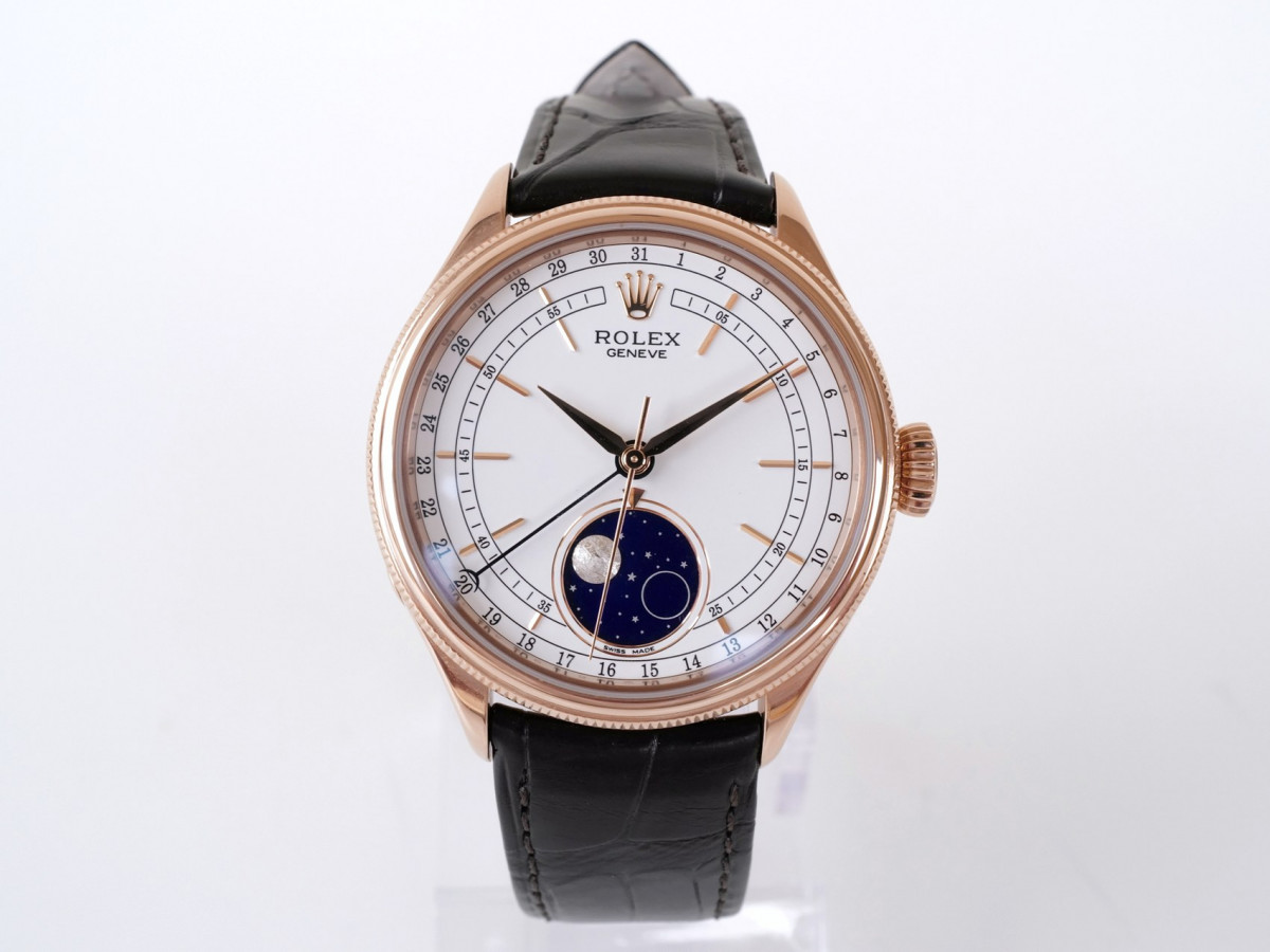 Швейцарские часы Rolex Cellini Moonphase 18K Rose Gold White Dial Black Strap Discontinued