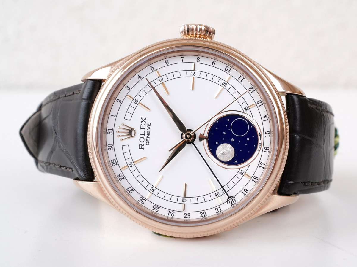 Швейцарские часы Rolex Cellini Moonphase 18K Rose Gold White Dial Black Strap Discontinued