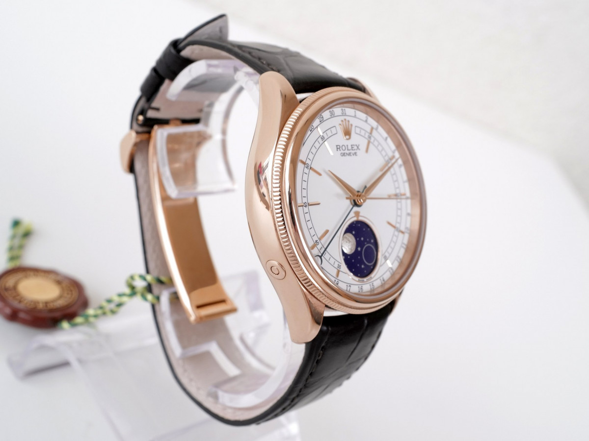 Швейцарские часы Rolex Cellini Moonphase 18K Rose Gold White Dial Black Strap Discontinued
