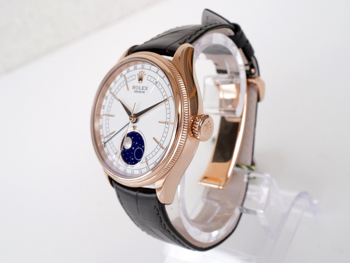 Швейцарские часы Rolex Cellini Moonphase 18K Rose Gold White Dial Black Strap Discontinued