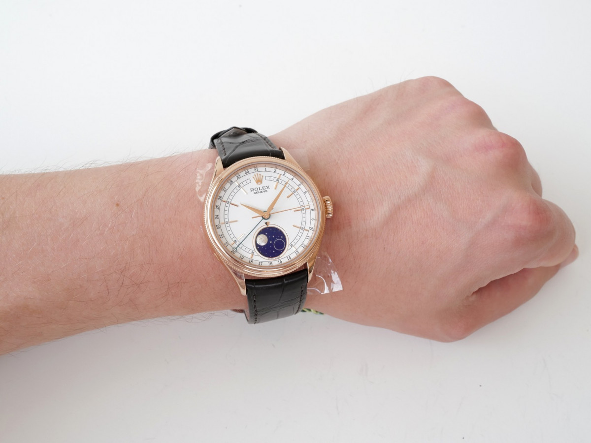 Швейцарские часы Rolex Cellini Moonphase 18K Rose Gold White Dial Black Strap Discontinued