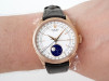 Швейцарские часы Rolex Cellini Moonphase 18K Rose Gold White Dial Black Strap Discontinued