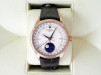 Швейцарские часы Rolex Cellini Moonphase 18K Rose Gold White Dial Black Strap Discontinued