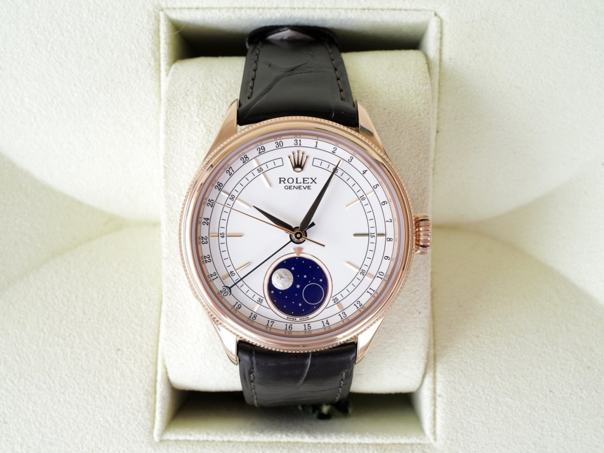 Швейцарские часы Rolex Cellini Moonphase 18K Rose Gold White Dial Black Strap Discontinued