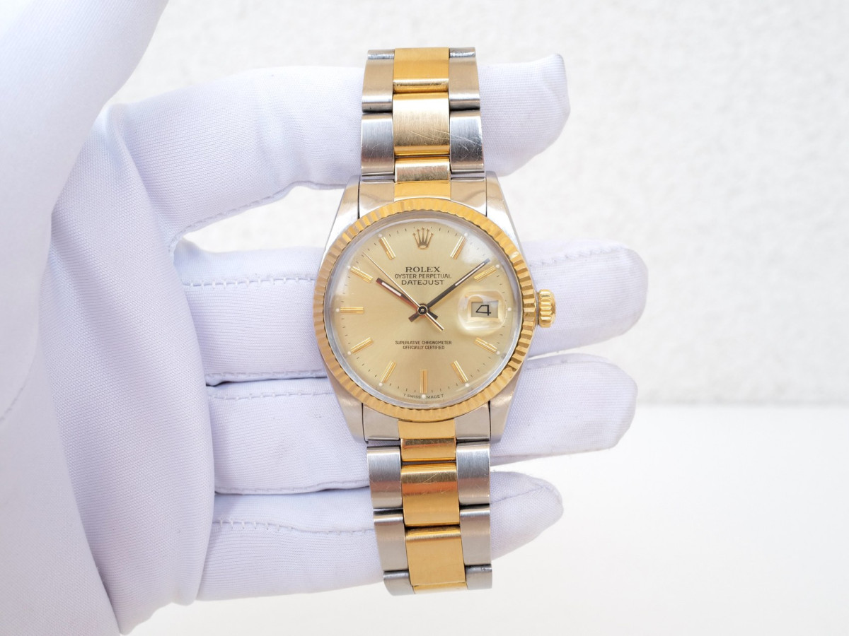 Швейцарський годинник Rolex Datejust 36 Oyster Gold Steel Champagne Dial