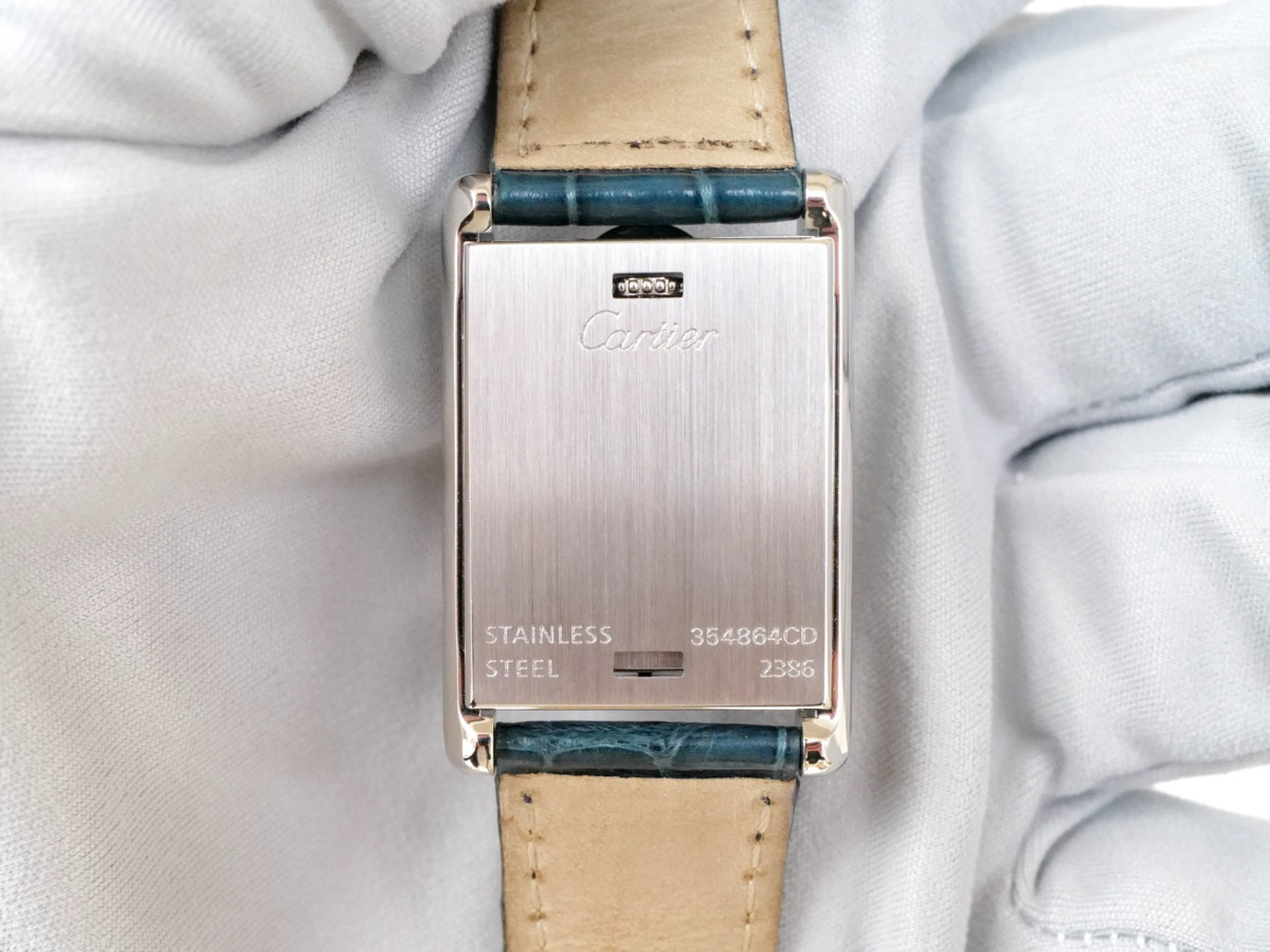Швейцарские часы Cartier Tank Basculante