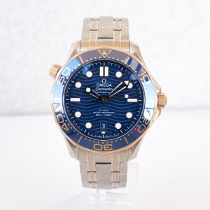 Швейцарские часы Omega Seamaster Diver 300M Co-Axial Master Chronometer 42 Blue Ceramic Sedna 18K Rose Gold Steel