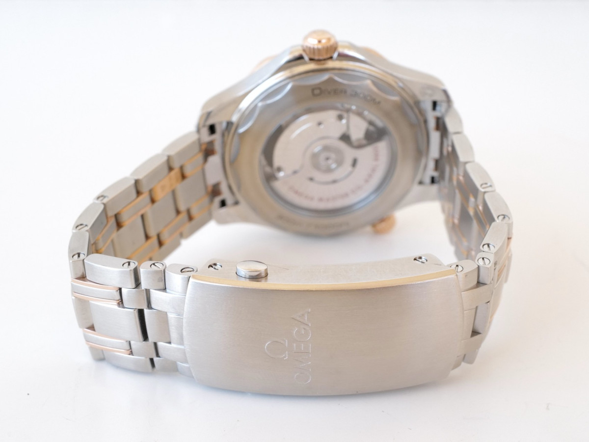 Швейцарские часы Omega Seamaster Diver 300M Co-Axial Master Chronometer 42 Blue Ceramic Sedna 18K Rose Gold Steel