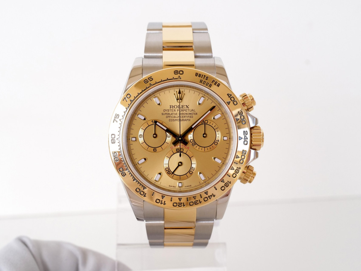 Швейцарские часы Rolex Cosmograph Daytona 18K Yellow Gold Steel Champagne Dial 40 (2020)