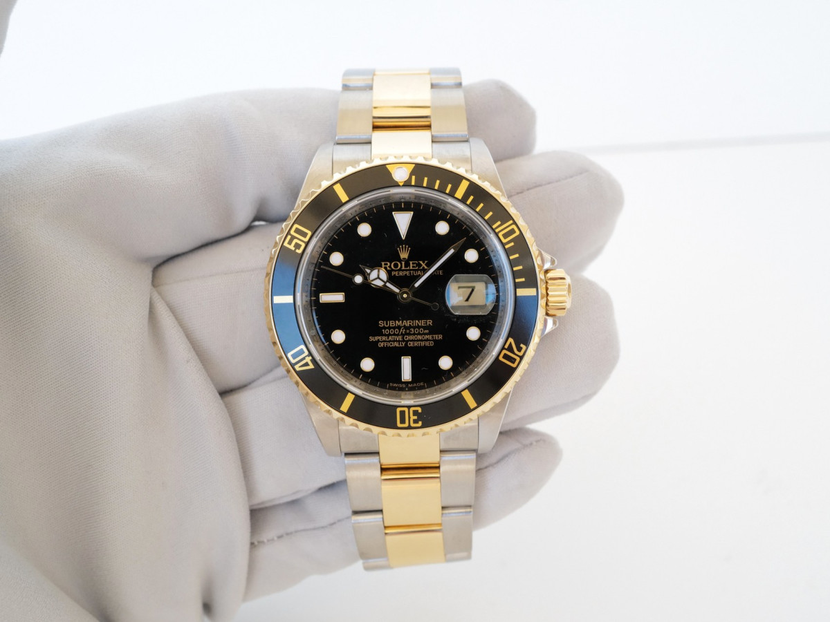 Swiss watch Rolex Submariner Date Black Dial Steel 18K Yellow Gold 40