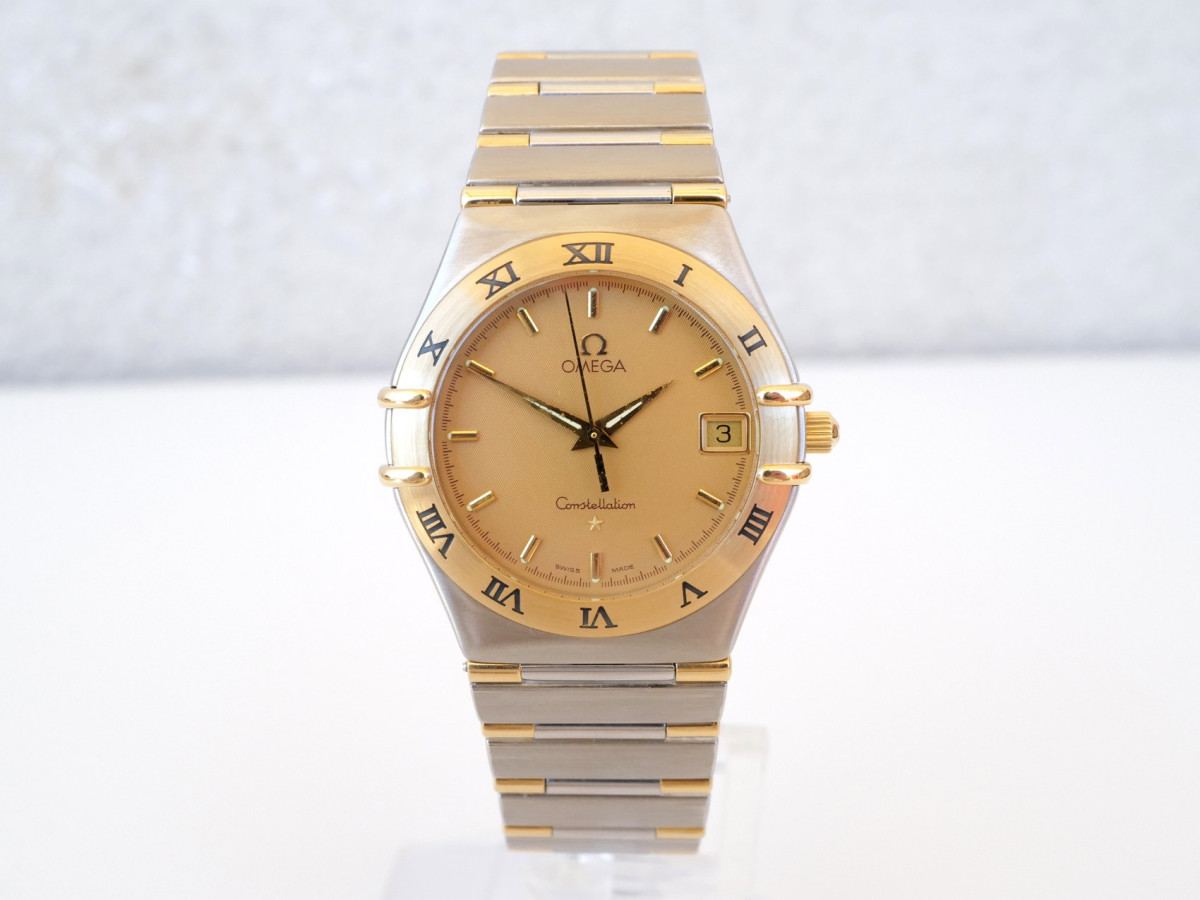 Швейцарський годинник Omega Constellation Quartz Steel 18K Yellow Gold Honeycomb Dial 34