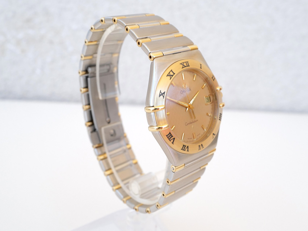 Швейцарський годинник Omega Constellation Quartz Steel 18K Yellow Gold Honeycomb Dial 34