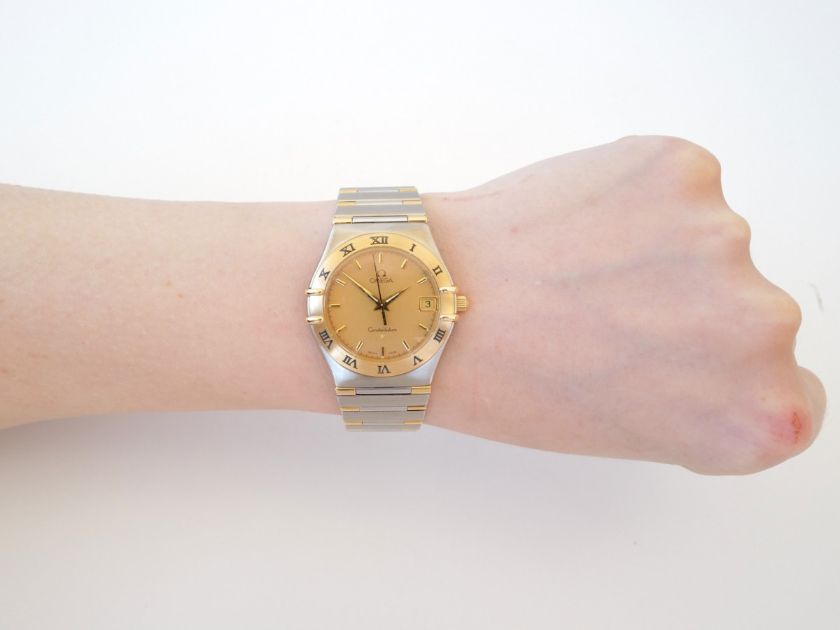 Швейцарський годинник Omega Constellation Quartz Steel 18K Yellow Gold Honeycomb Dial 34