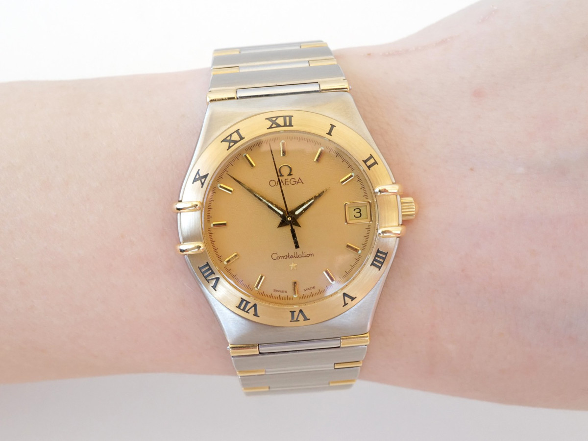 Швейцарський годинник Omega Constellation Quartz Steel 18K Yellow Gold Honeycomb Dial 34