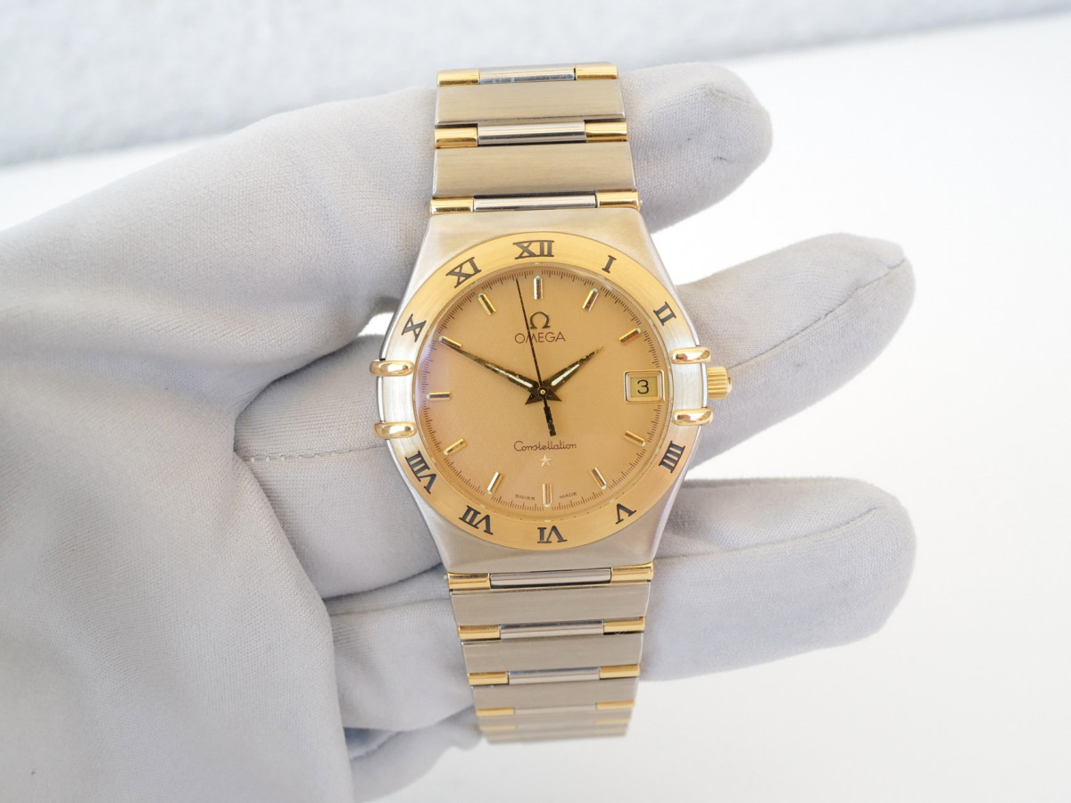 Швейцарський годинник Omega Constellation Quartz Steel 18K Yellow Gold Honeycomb Dial 34