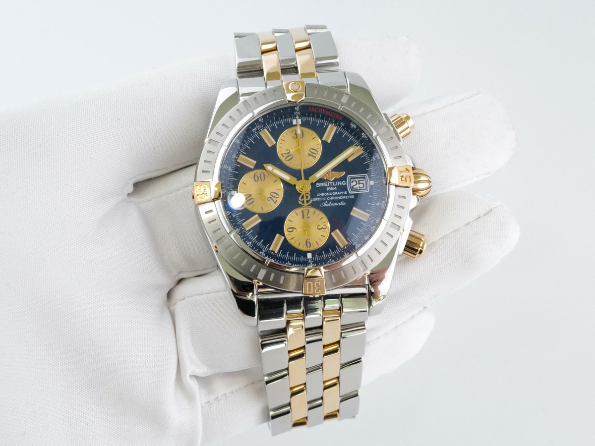 Швейцарские часы Breitling Chronomat Evolution Blue Dial Gold Steel 44